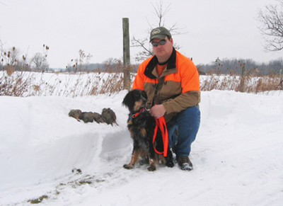 Mark with Ginger, Llewellin Setter after hunt at Ruffwood Game Farm